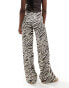 ASOS DESIGN textured wide leg trousers in zebra print