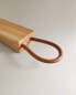 Wooden leather doorstop