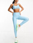 Under Armour Evolved Core graphic leggings in light blue