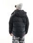 Columbia – Snowqualmie – Steppjacke in Schwarz mit abnehmbarer Kapuze