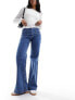 & Other Stories high waist flared jeans in mid blue