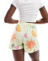 ASOS DESIGN holiday print boxer shorts in soft yellow