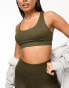 Puma Training Evolve medium support sports bra in khaki