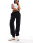 Monki joggers with cuffed hem in black