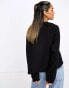 ASOS DESIGN oversized sweat with raglan detail in black