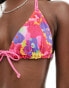 Reclaimed Vintage tie front triangle bikini top in bright blurred floral print