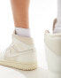 Nike Air Jordan 1 Mid trainers in off white and stone