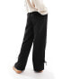 Pieces Petite high waisted tailored trousers with tie detail in black