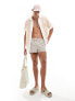 ASOS DESIGN swim shorts in super short length in beige