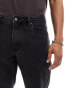 ASOS DESIGN tapered fit jeans with panelling detail in washed black - BLACK