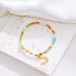 Playful gold-plated bracelet with colorful beads