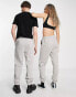 COLLUSION Unisex joggers with text print in grey