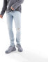 ASOS DESIGN skinny jeans with rips in light blue tinted wash