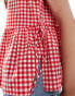 ASOS DESIGN tie side slash neck swing top in red gingham