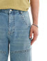 ASOS DESIGN loose jeans with carpenter detail in a mid wash blue