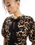 ASOS DESIGN puff sleeve tie front mini dress in leopard print