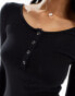 Pieces button front long sleeved ribbed mini dress in black