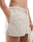 ASOS DESIGN swim shorts in super short length in beige