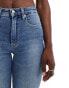 Calvin Klein Jeans high rise skinny jeans in mid wash