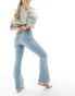 ASOS DESIGN Hourglass mid rise flare jeans in light blue