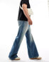 Weekday Time loose fit bootcut jeans in streaky blue wash