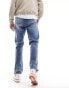 ASOS DESIGN jogger jeans with toggles in mid wash blue