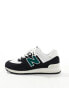 New Balance 574 trainers in black and green