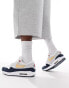 Nike Air Max 1 SC trainers in white, navy and gold