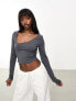 ASOS DESIGN asymmetric scooped neck long sleeved crop top in charcoal