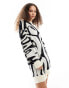 Monki oversized knitted mini dress in mono swirl pattern jacquard