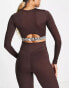 Daisy Street Active Distorted Geo cropped long sleeve top with cutout in brown checkerboard