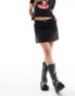 COLLUSION denim cut off mini skirt in washed black