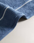 Embroidered trim bath towel