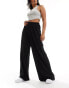 ASOS DESIGN plisse wide leg trouser in black