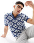 ASOS DESIGN knitted crochet revere polo in navy and ecru