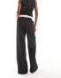 Extro & Vert tailored pinstripe trouser with asymmetric waistband in black co-ord