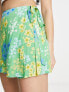 ASOS DESIGN wrap tie skort in green meadow floral print