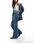 Wrangler fierce flared jeans in mid blue