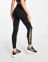 HIIT – Leggings in Schwarz mit Zierknoten-Details am Rücken