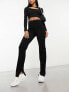 & Other Stories high waist tailored flared trousers with clean waistband in black