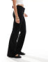 Weekday Kate low waist slightly flared trousers in black