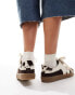 Stradivarius leather trainer in cow print