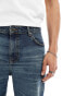 ASOS DESIGN tapered jeans in dark wash blue