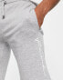 FCUK side scribble jersey shorts in light grey