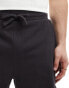 ASOS DESIGN slim shorts in black waffle