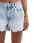 Miss Selfridge heart pocket denim shorts in mid wash blue