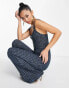 ASOS DESIGN boucle button front jumpsuit with flare leg in houndstooth