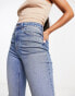 ASOS DESIGN ultimate skinny jean in mid blue with knee rips