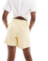 adidas Originals essentials jersey shorts in pale yellow