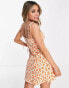 ASOS DESIGN mini button through tie shoulder sundress in orange ditsy floral